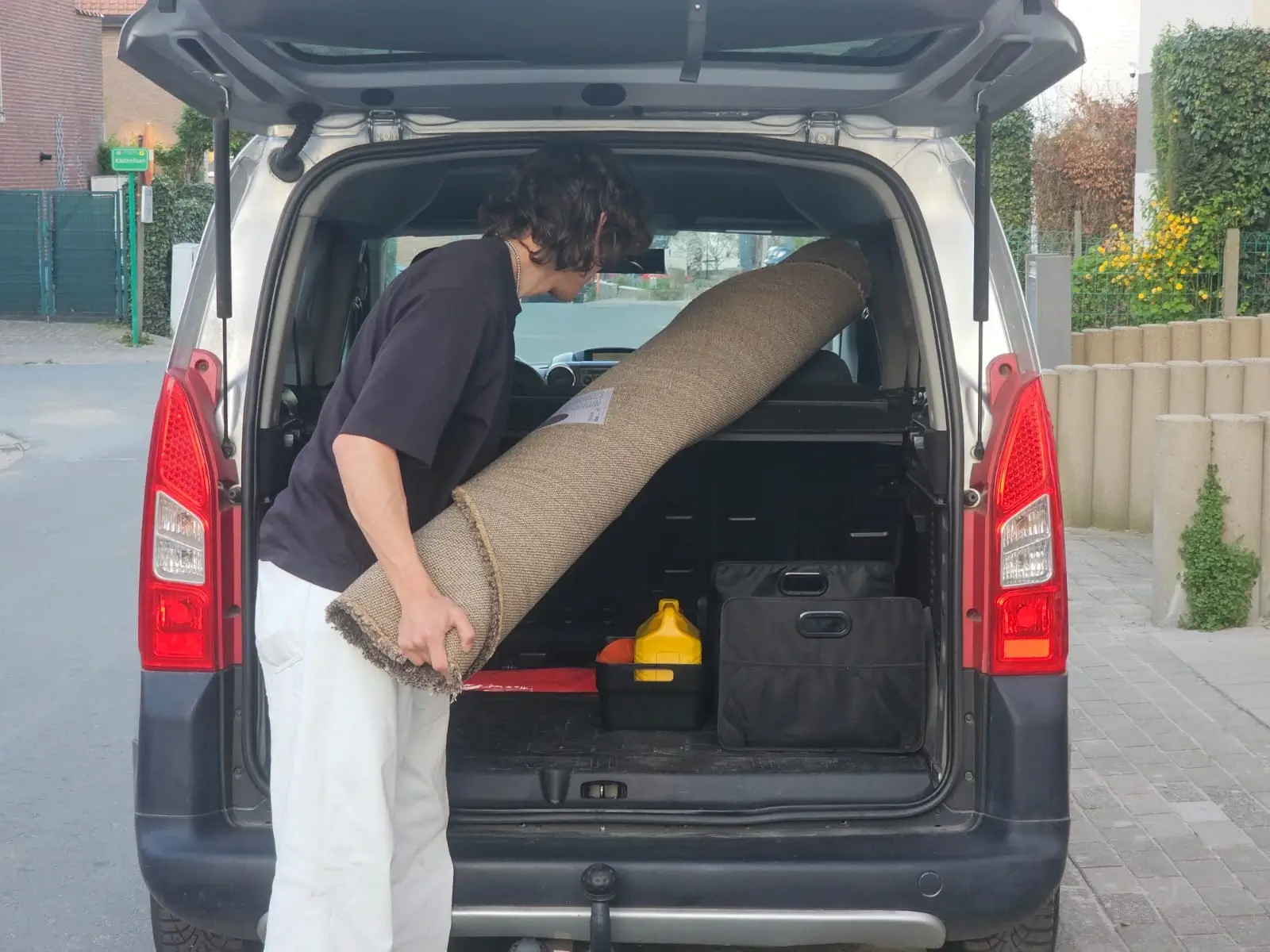 Récupération de tapis à domicile par notre équipe à Woluwe